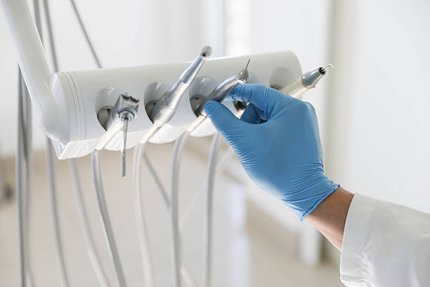 Professional Tooth Extraction technician working in Coats, NC